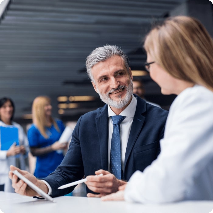 Doctor talking to a pharmaceutical sales representative.